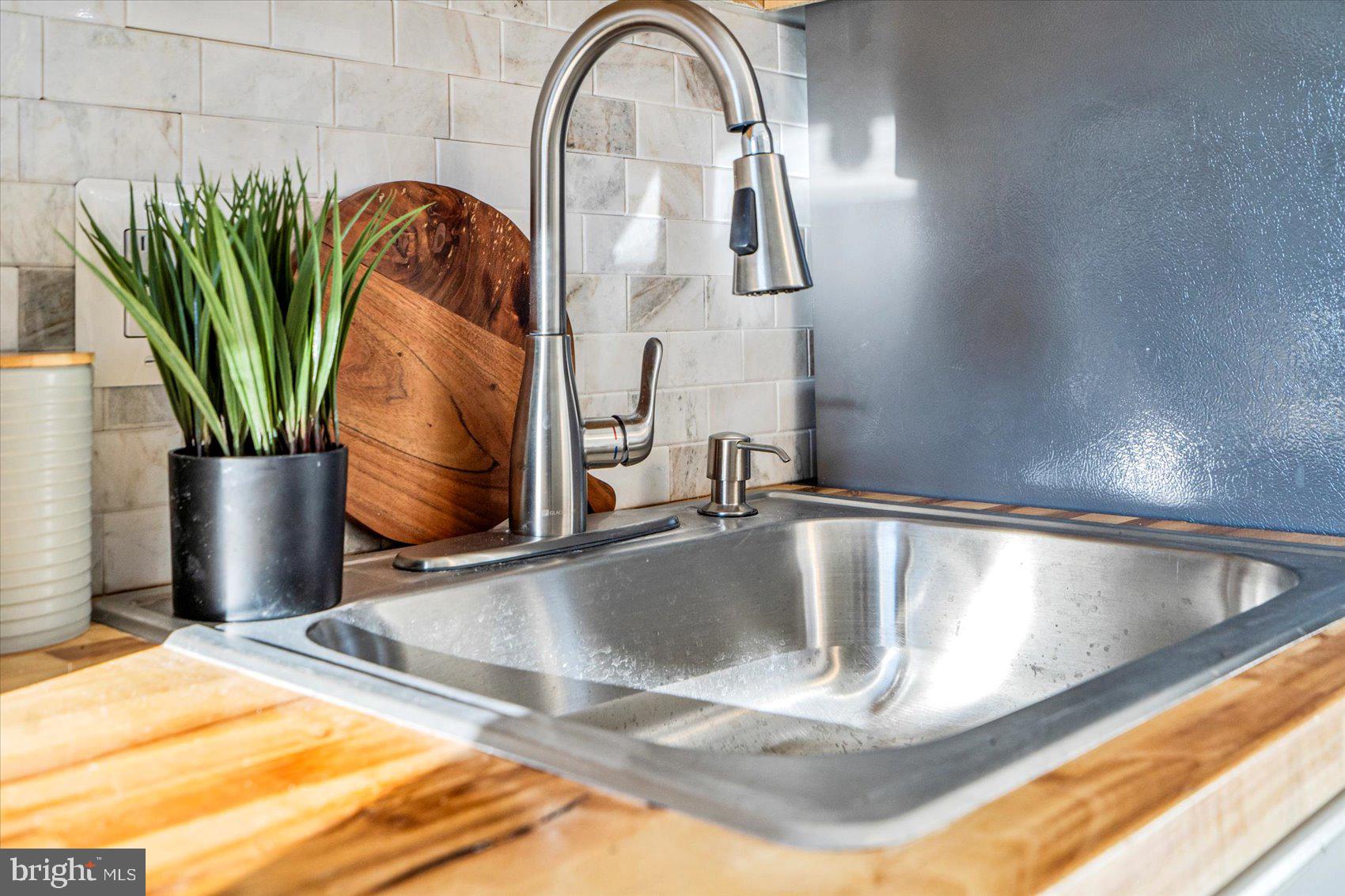 3925 Chesterfield Avenue Baltimore, MD 21213 - Photo 16 of 35 a view of a sink in a kitchen