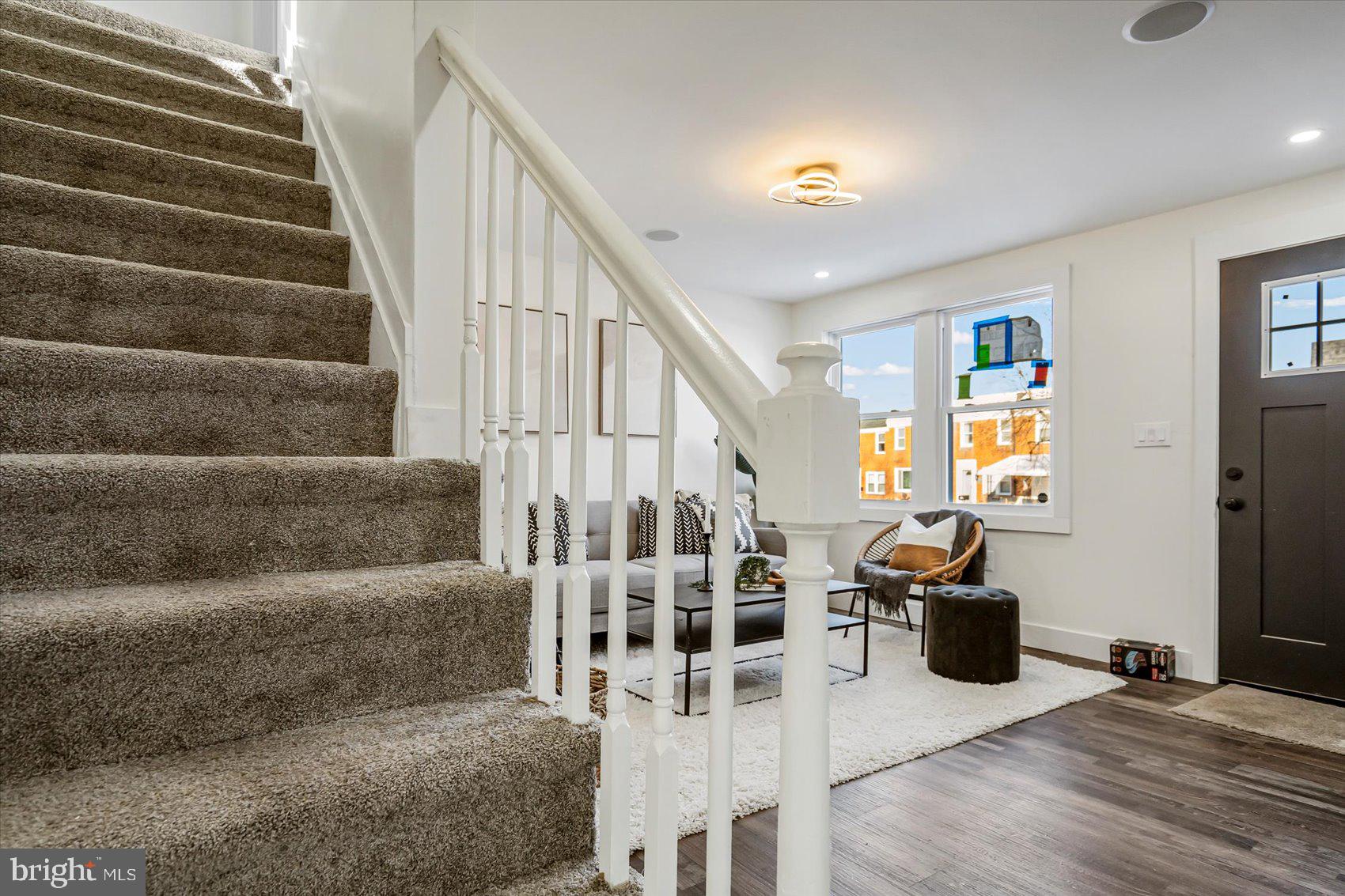 3925 Chesterfield Avenue Baltimore, MD 21213 - Photo 7 of 35 a view of entryway and hall with wooden floor