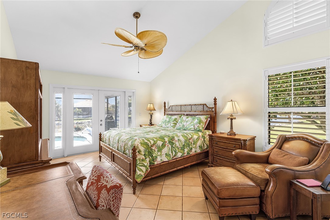 7747 Grande Pine Road Bokeelia, FL 33922 - Photo 20 of 45 a bedroom with a bed and balcony