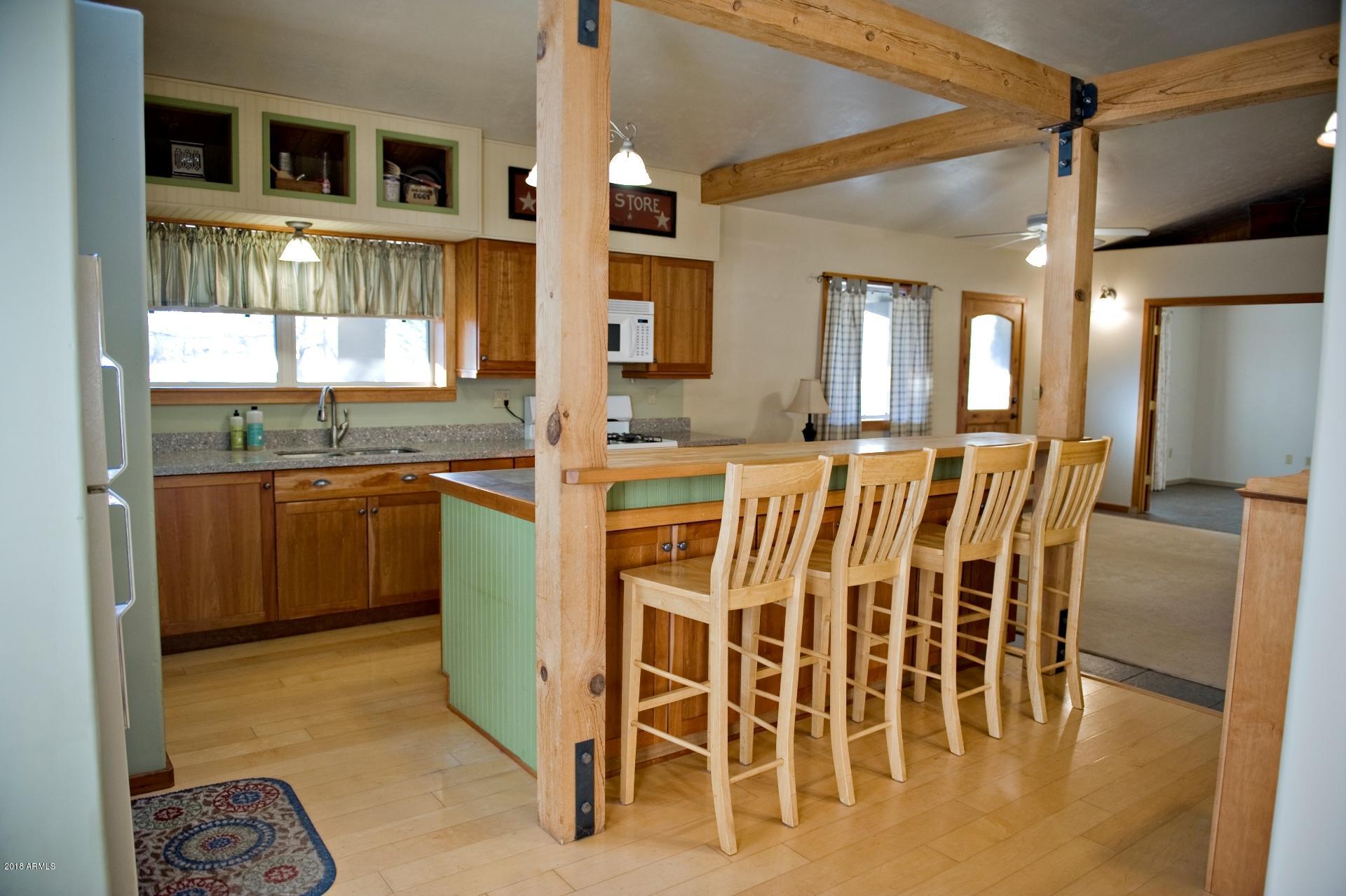 4933 German Ranch Road Strawberry, AZ 85544 - Photo 9 of 42 Kitchen - Breakfast bar island