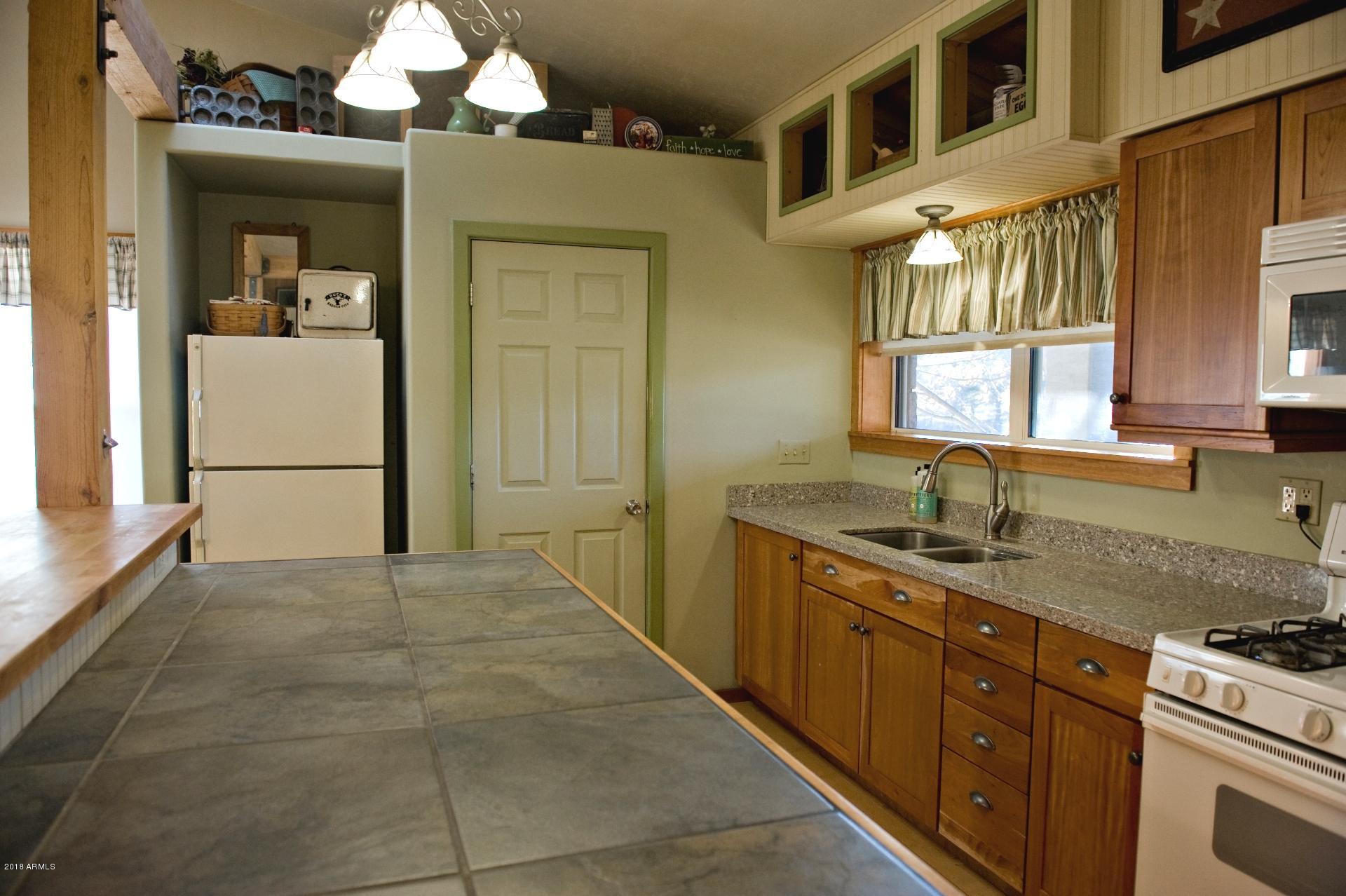 4933 German Ranch Road Strawberry, AZ 85544 - Photo 10 of 42 Kitchen Island