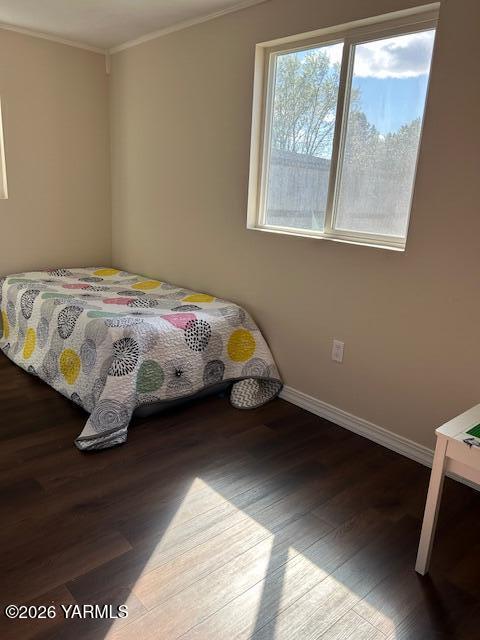 208 South 47th Avenue Yakima, WA 98908 - Photo 11 of 22 a bedroom with a bed and a window