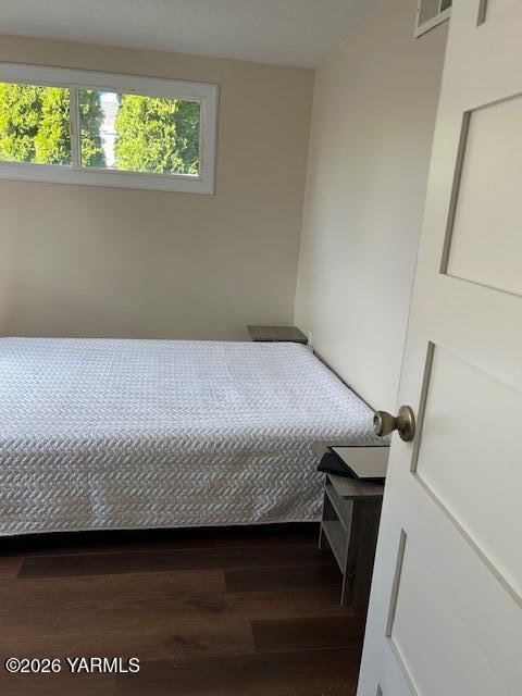 208 South 47th Avenue Yakima, WA 98908 - Photo 13 of 22 a bedroom with a bed and a window