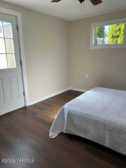 208 South 47th Avenue Yakima, WA 98908 - Photo 14 of 22 a bed sitting in a bedroom next to a window
