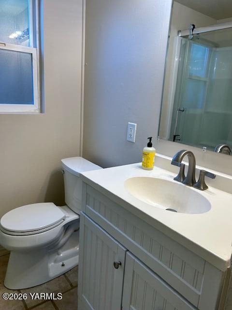 208 South 47th Avenue Yakima, WA 98908 - Photo 18 of 22 a bathroom with a sink and a toilet