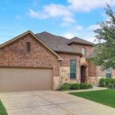 a front view of house with yard