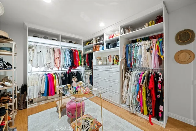 a bathroom with a sink a toilet and shower curtain