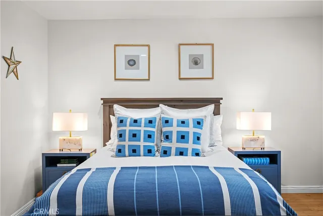 a bedroom with a bed and a table