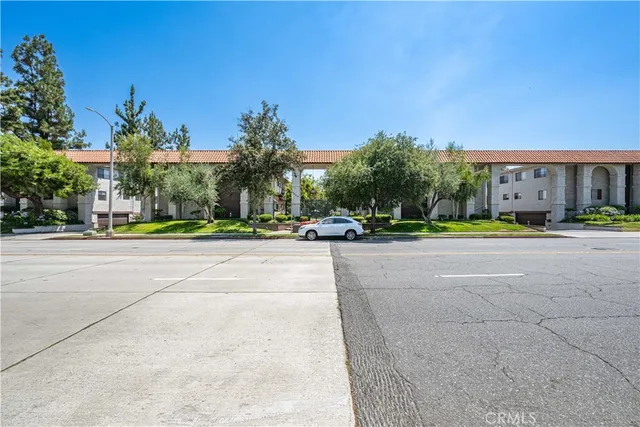 a view of a house with a street