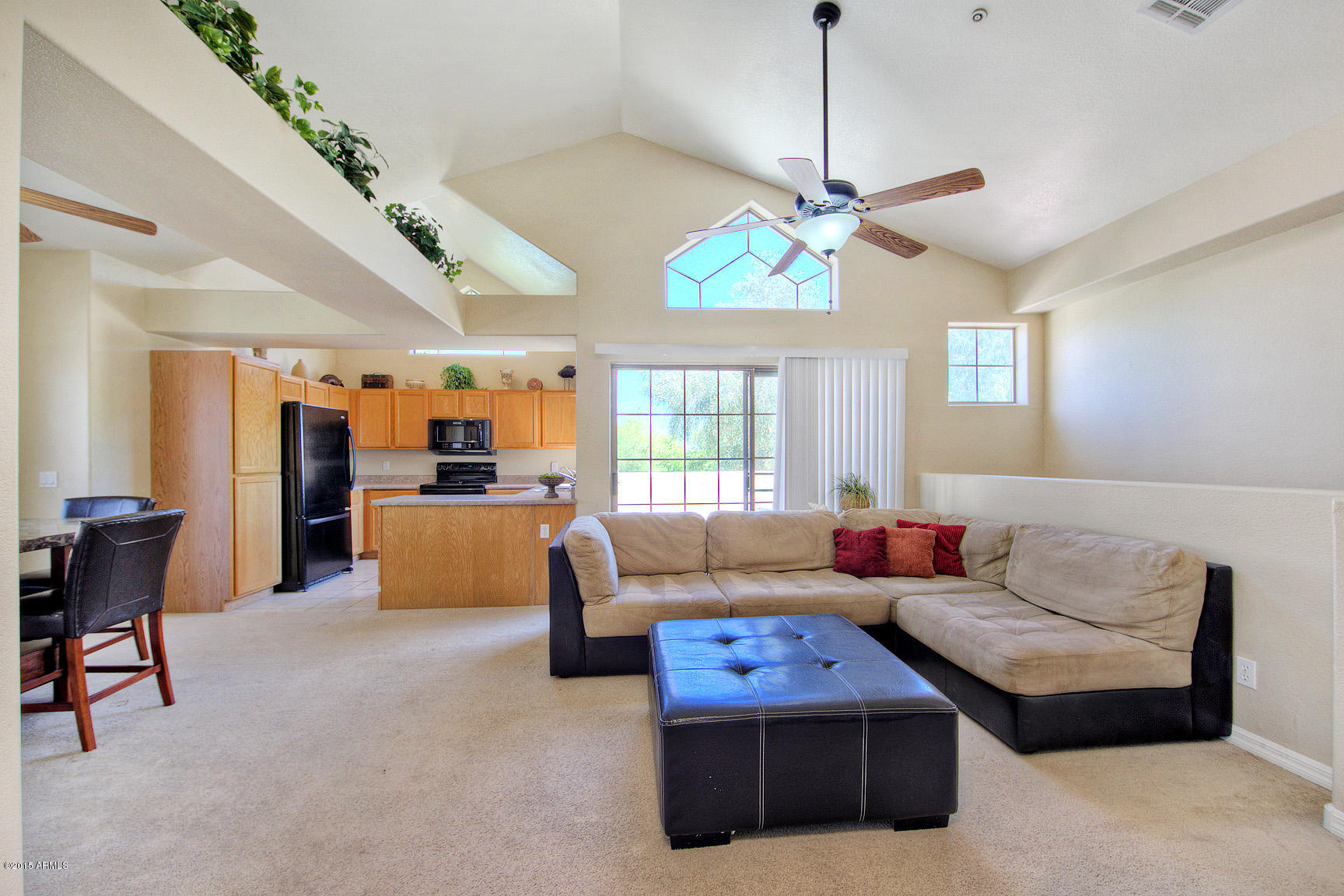 2801 North Litchfield Road, Unit 68 Goodyear, AZ 85395 - Photo 15 of 20 Living room view to patio