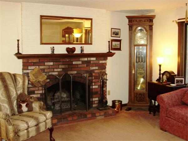 64 Squannacook Road Shirley, MA 01464 - Photo 5 of 13 a living room with furniture and a fireplace