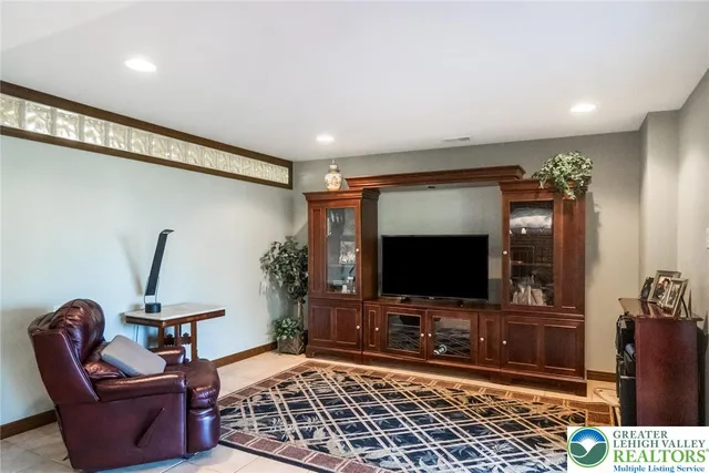 a view of an empty room and a window