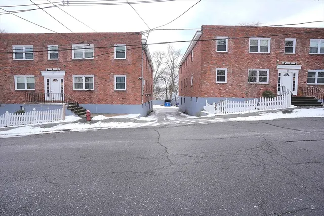a view of building with yard