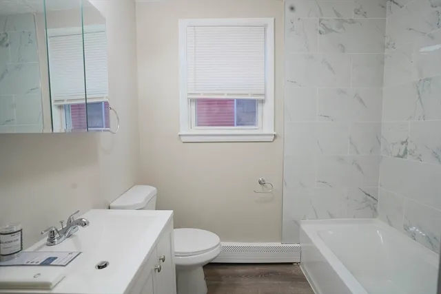 a bathroom with a sink and toilet