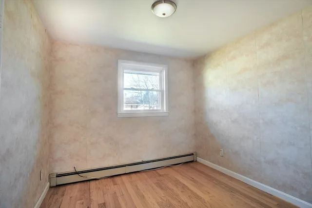 an empty room with a window