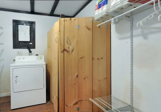 a bathroom with a shower a sink and a shower curtain