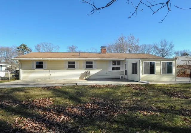 front view of a house with a patio