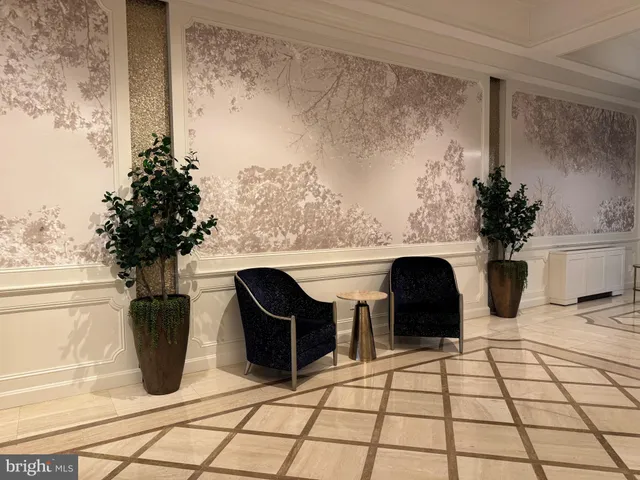 a view of a swimming pool and tennis court