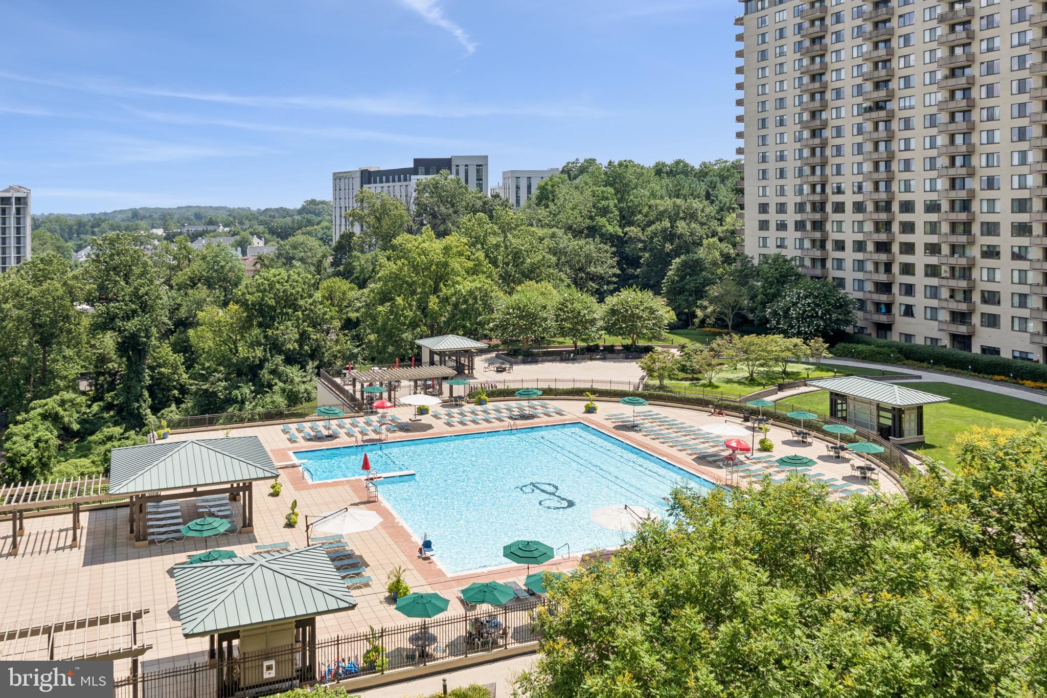 5225 Pooks Hill, Unit 710N Bethesda, MD 20814 - Photo 23 of 64 a view of a swimming pool with a patio