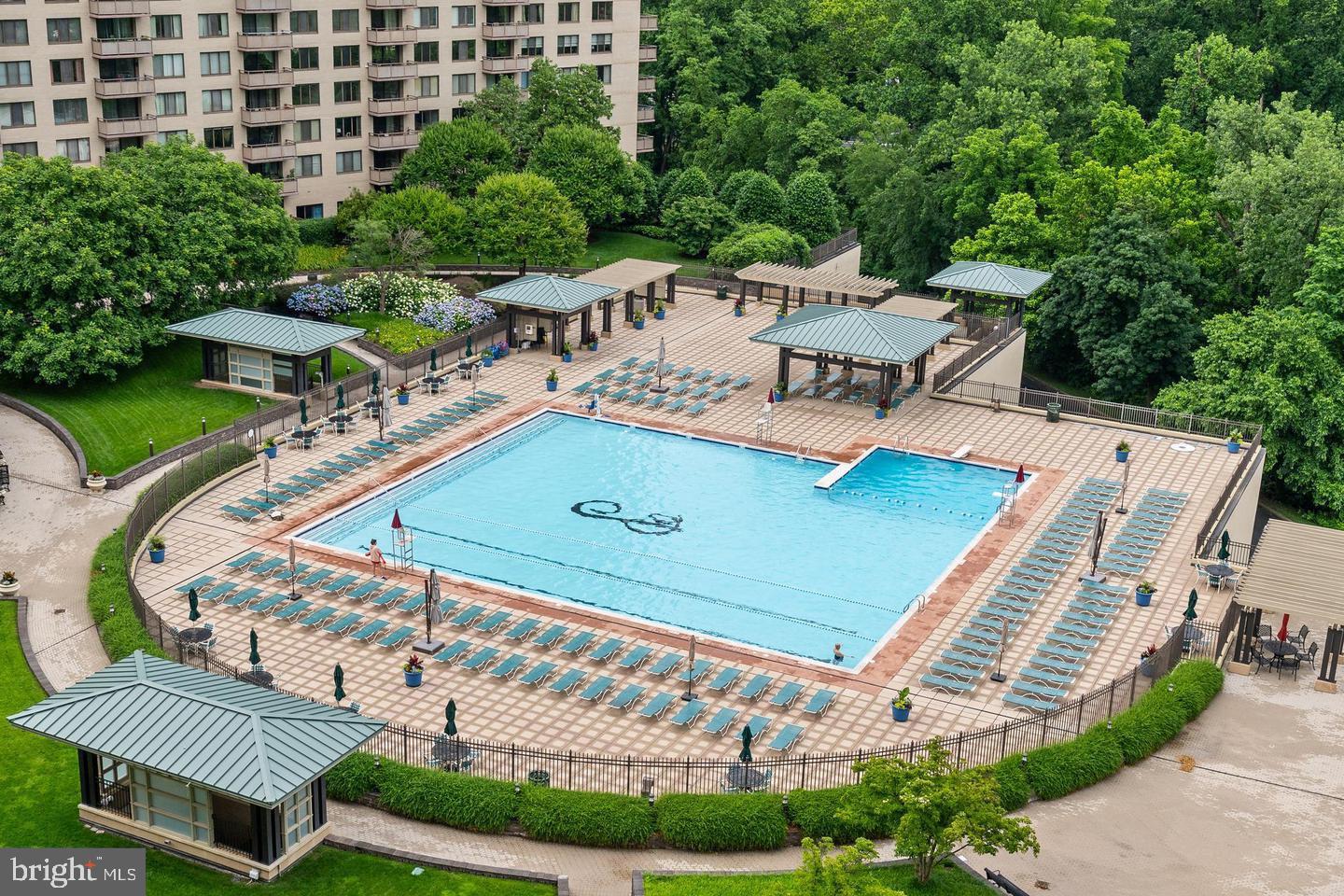 5225 Pooks Hill, Unit 710N Bethesda, MD 20814 - Photo 26 of 64 a view of a swimming pool with a patio