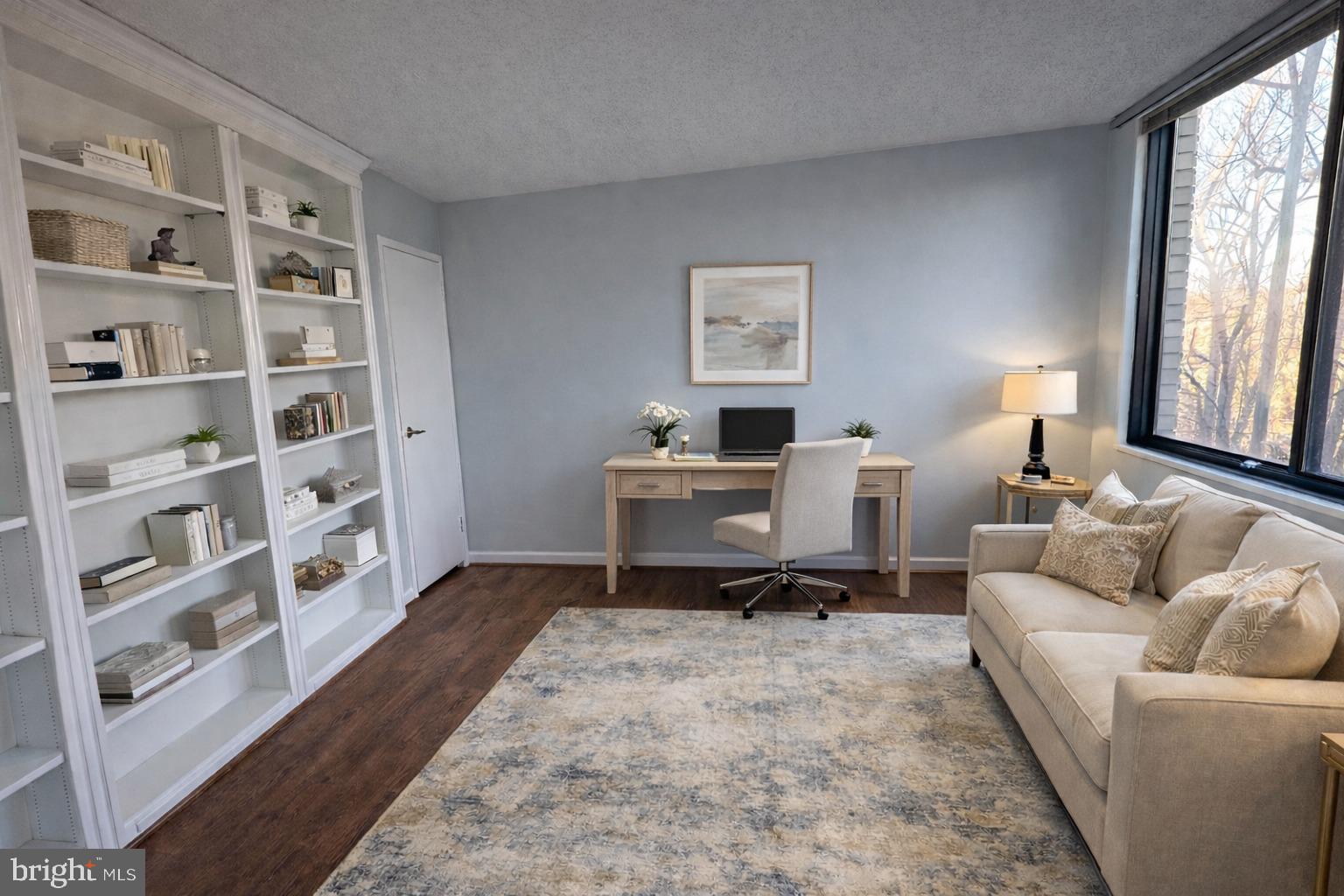 5225 Pooks Hill, Unit 710N Bethesda, MD 20814 - Photo 44 of 64 a living room with furniture and a lamp