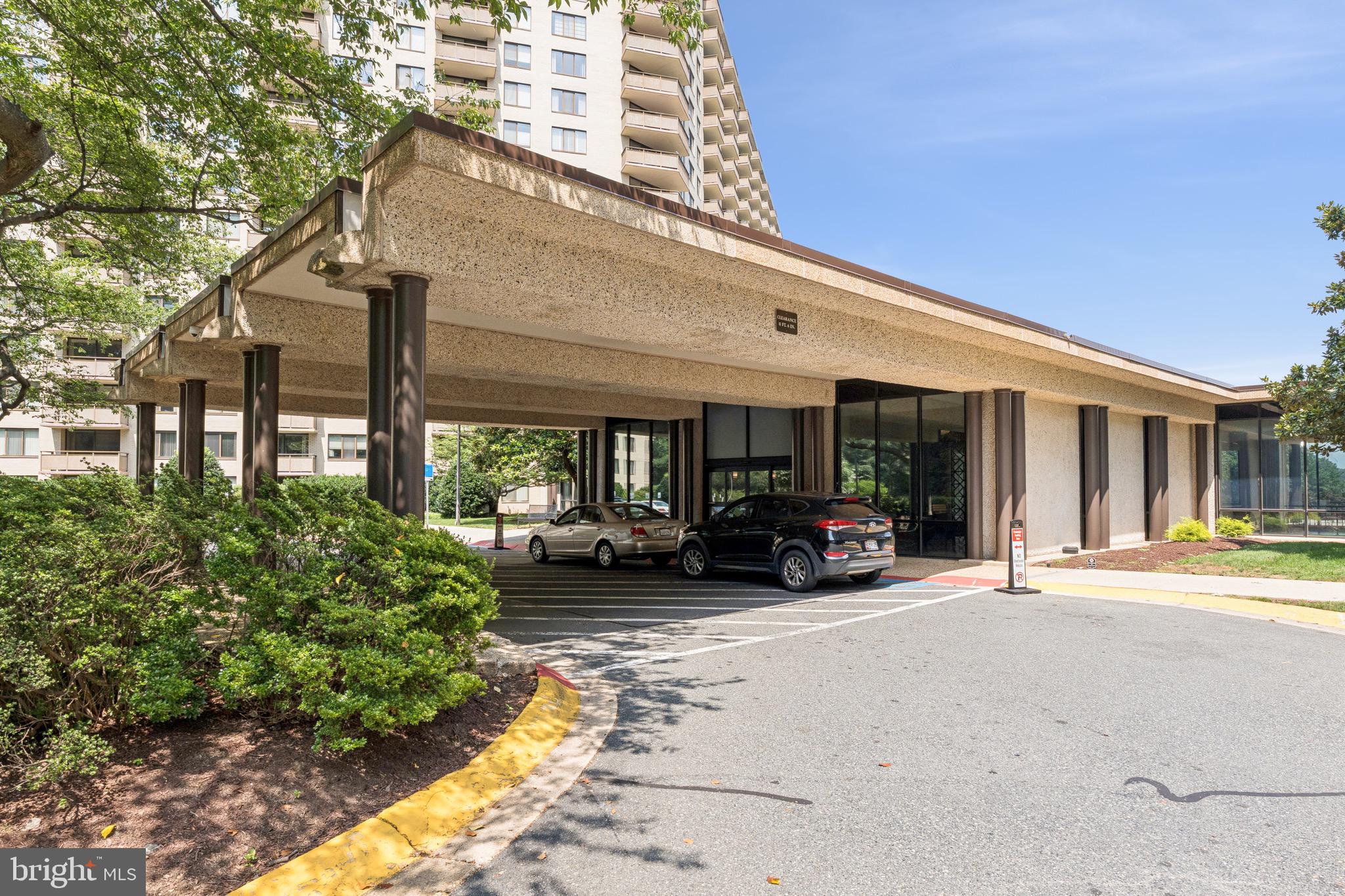 5225 Pooks Hill, Unit 710N Bethesda, MD 20814 - Photo 5 of 64 a view of a building with sitting area and roof deck