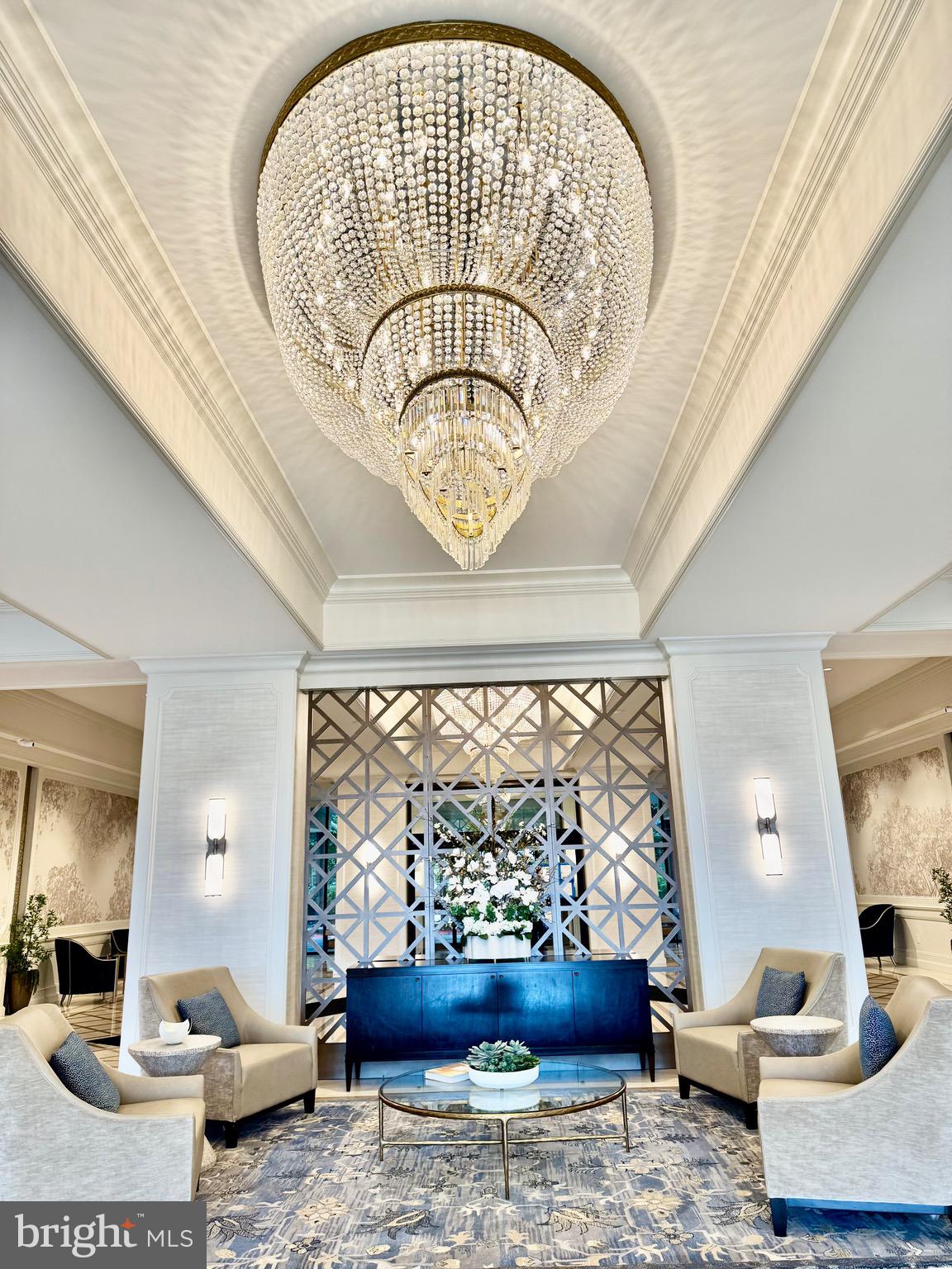 5225 Pooks Hill, Unit 710N Bethesda, MD 20814 - Photo 8 of 64 a living room with a couch and a large window