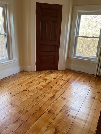 36 Cambridge Street Ayer, MA 01432 - Photo 22 of 28 a view of an empty room with a window