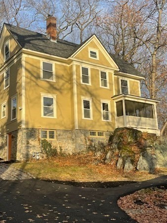 36 Cambridge Street Ayer, MA 01432 - Photo 27 of 28 a front view of a house with a yard