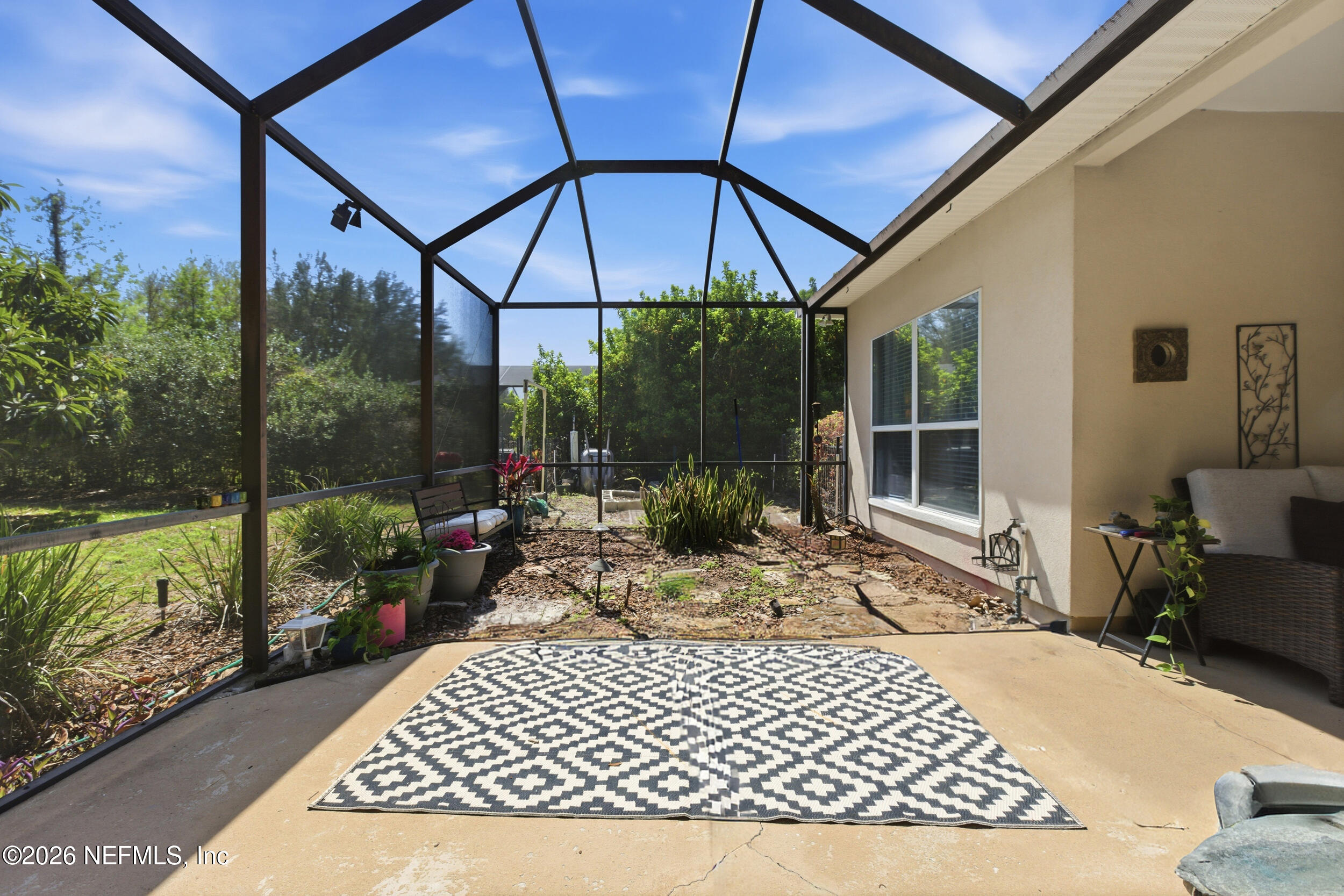 14779 Amelia View Drive Jacksonville, FL 32226 - Photo 45 of 81 Screened Lanai with Garden Views