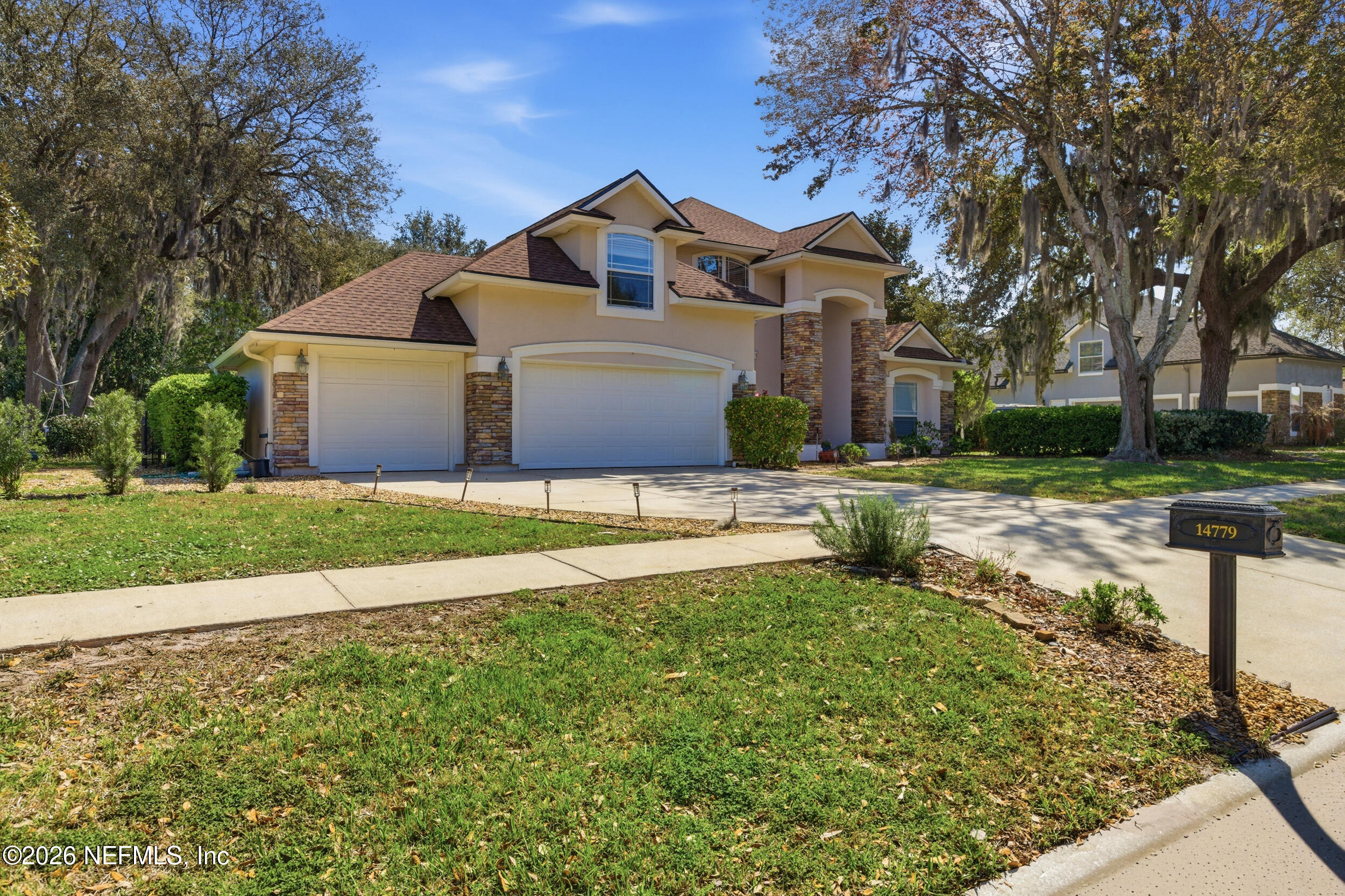 14779 Amelia View Drive Jacksonville, FL 32226 - Photo 7 of 81 Exterior Angle with Three-Car Garage