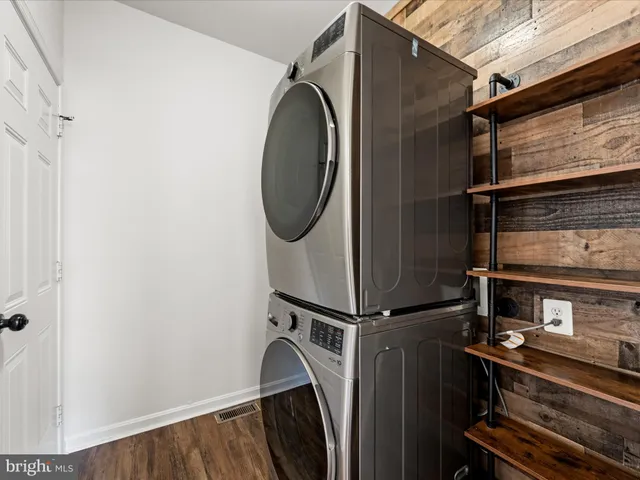 a view of a room with racks on the wall