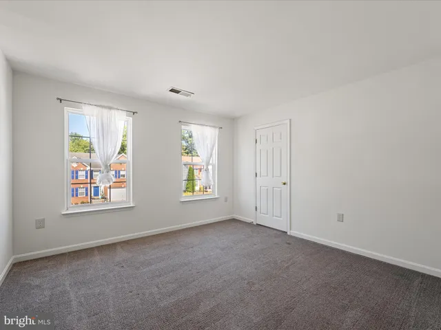 a view of a backyard with wooden floor