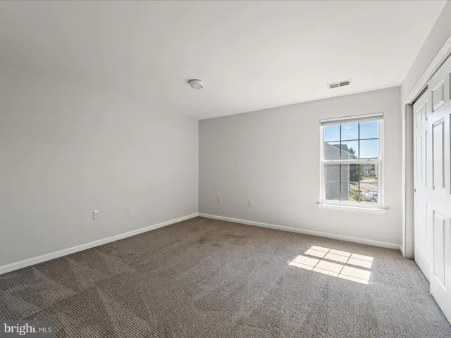 a view of yard with patio