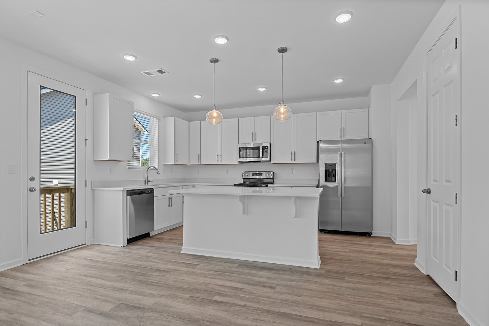 138 Timber Crest Trail White Bluff, TN 37187 - Photo 5 of 21 a kitchen with a refrigerator sink and cabinets