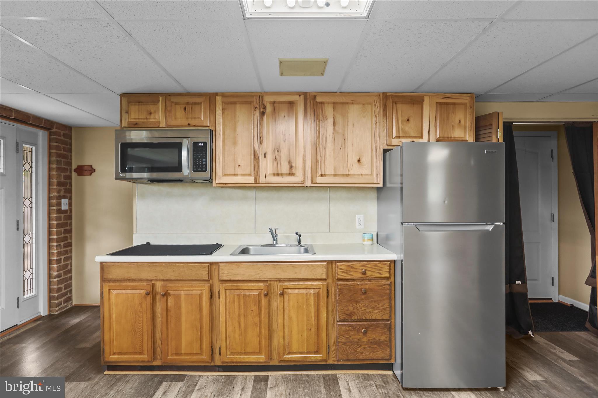 88 Sunset Drive Hanover, PA 17331 - Photo 31 of 51 a kitchen with stainless steel appliances granite countertop a refrigerator and a microwave