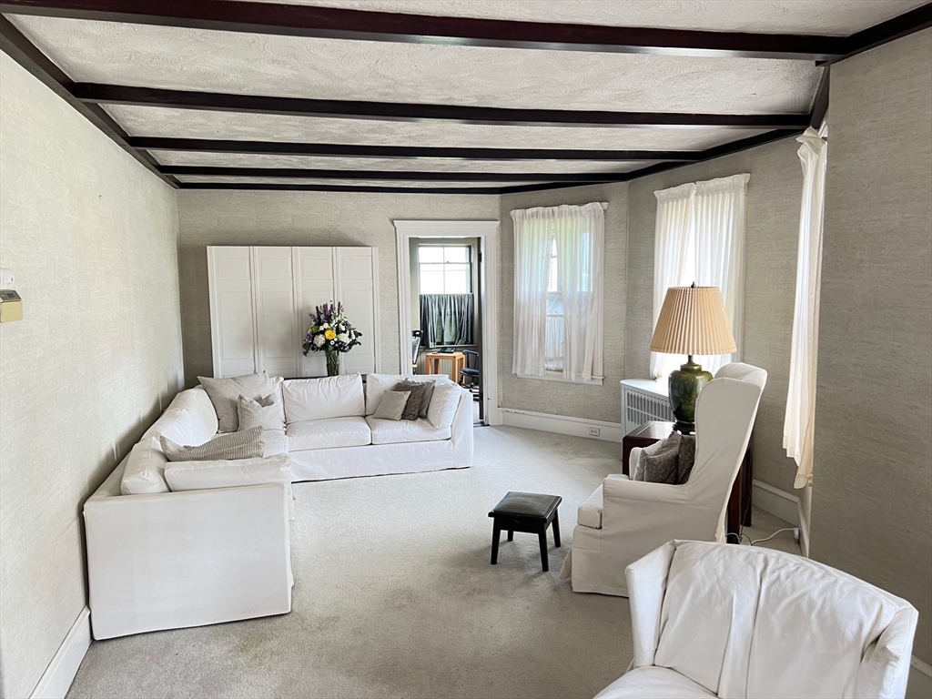 17 Winthrop Street Winthrop, MA 02152 - Photo 13 of 33 a living room with furniture and a potted plant