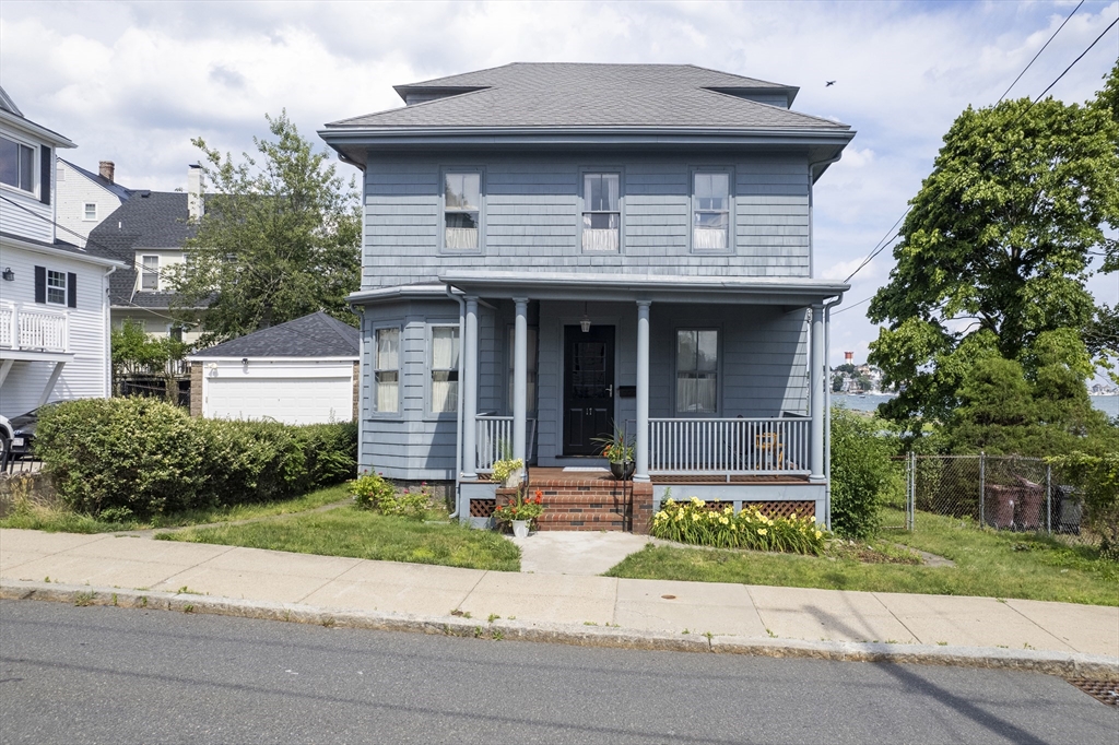 17 Winthrop Street Winthrop, MA 02152 - Photo 30 of 33 a front view of a house with a yard and garage