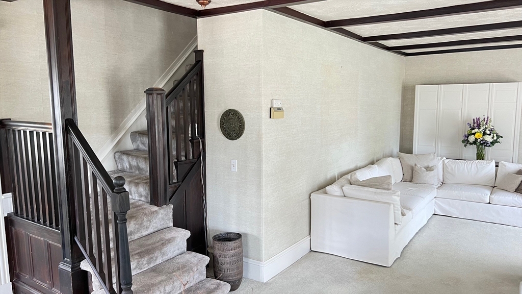 17 Winthrop Street Winthrop, MA 02152 - Photo 7 of 33 a living room with a furniture and a ceiling fan