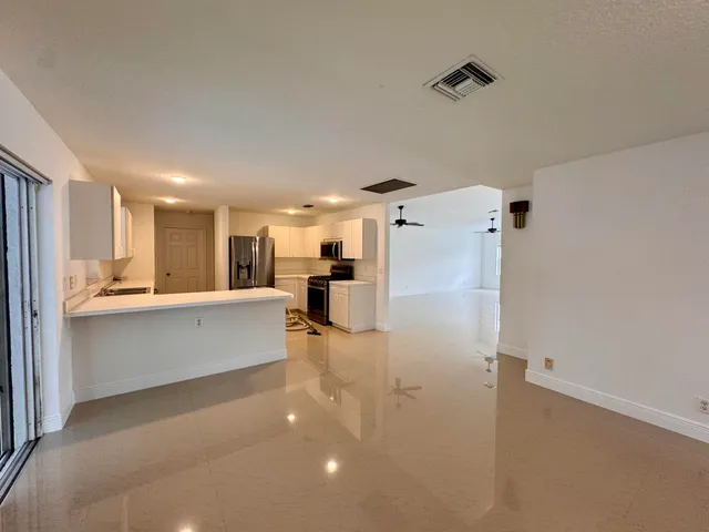 a view of a livingroom with a window
