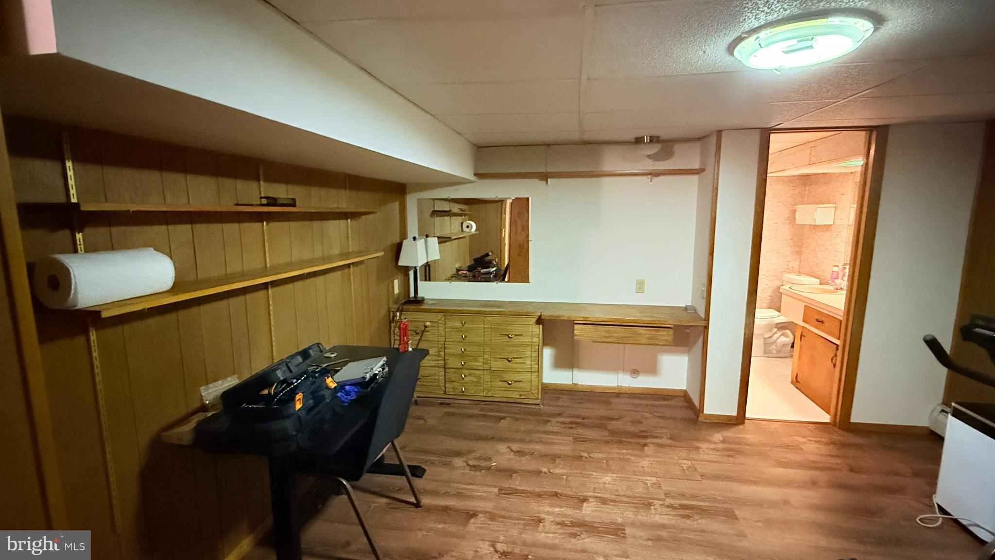 242 Spring Street State College, PA 16801 - Photo 63 of 73 Basement -Cozy workspace with warm wooden accents.