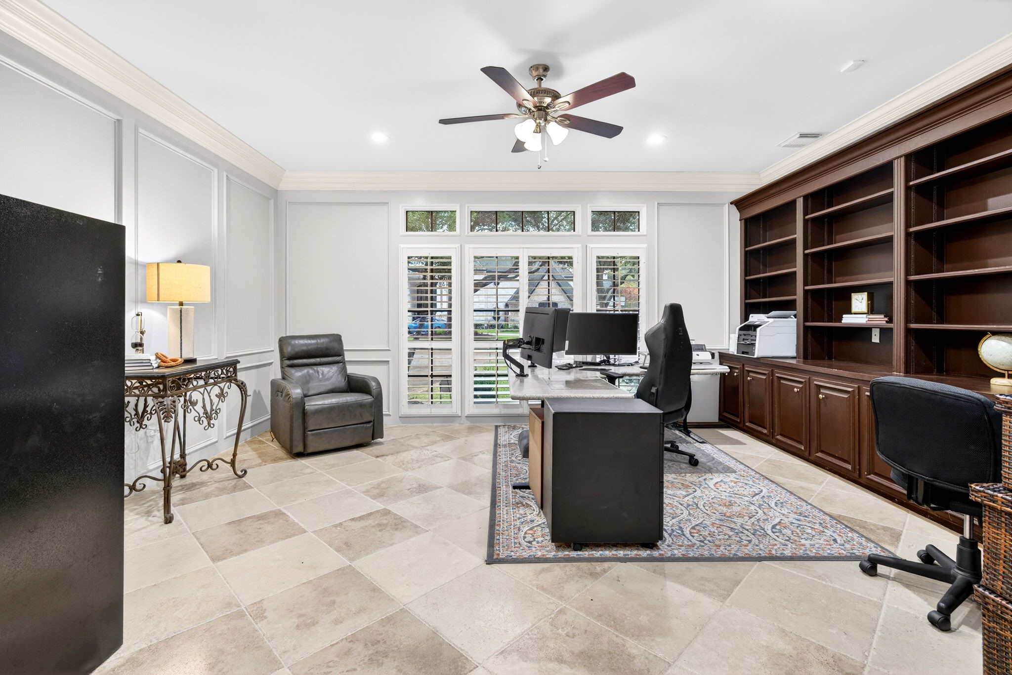 20006 Gable Point Drive Katy, TX 77450 - Photo 14 of 44 a work room with furniture windows and a flat screen tv