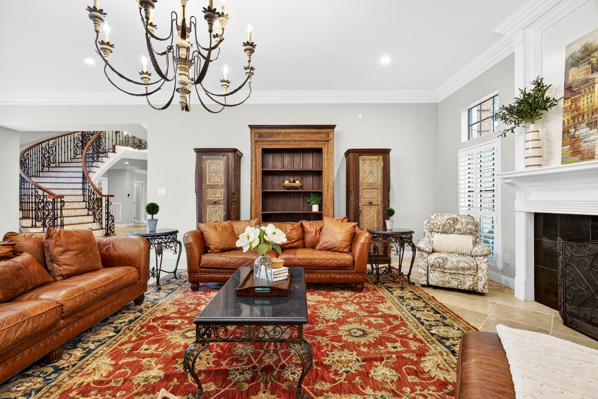 20006 Gable Point Drive Katy, TX 77450 - Photo 15 of 44 a living room with furniture chandelier and a fireplace