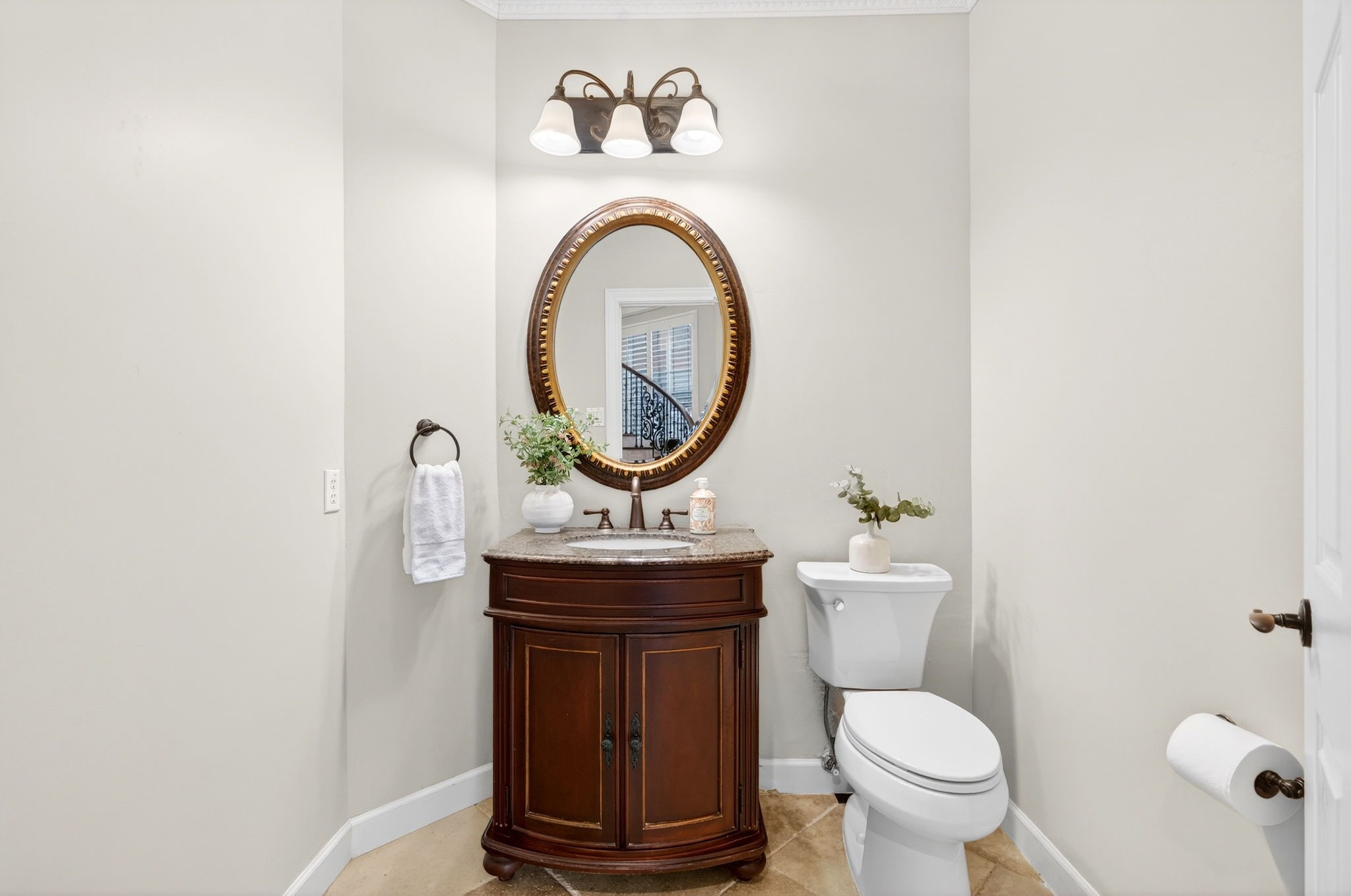 20006 Gable Point Drive Katy, TX 77450 - Photo 17 of 44 a bathroom with a toilet a sink and a mirror