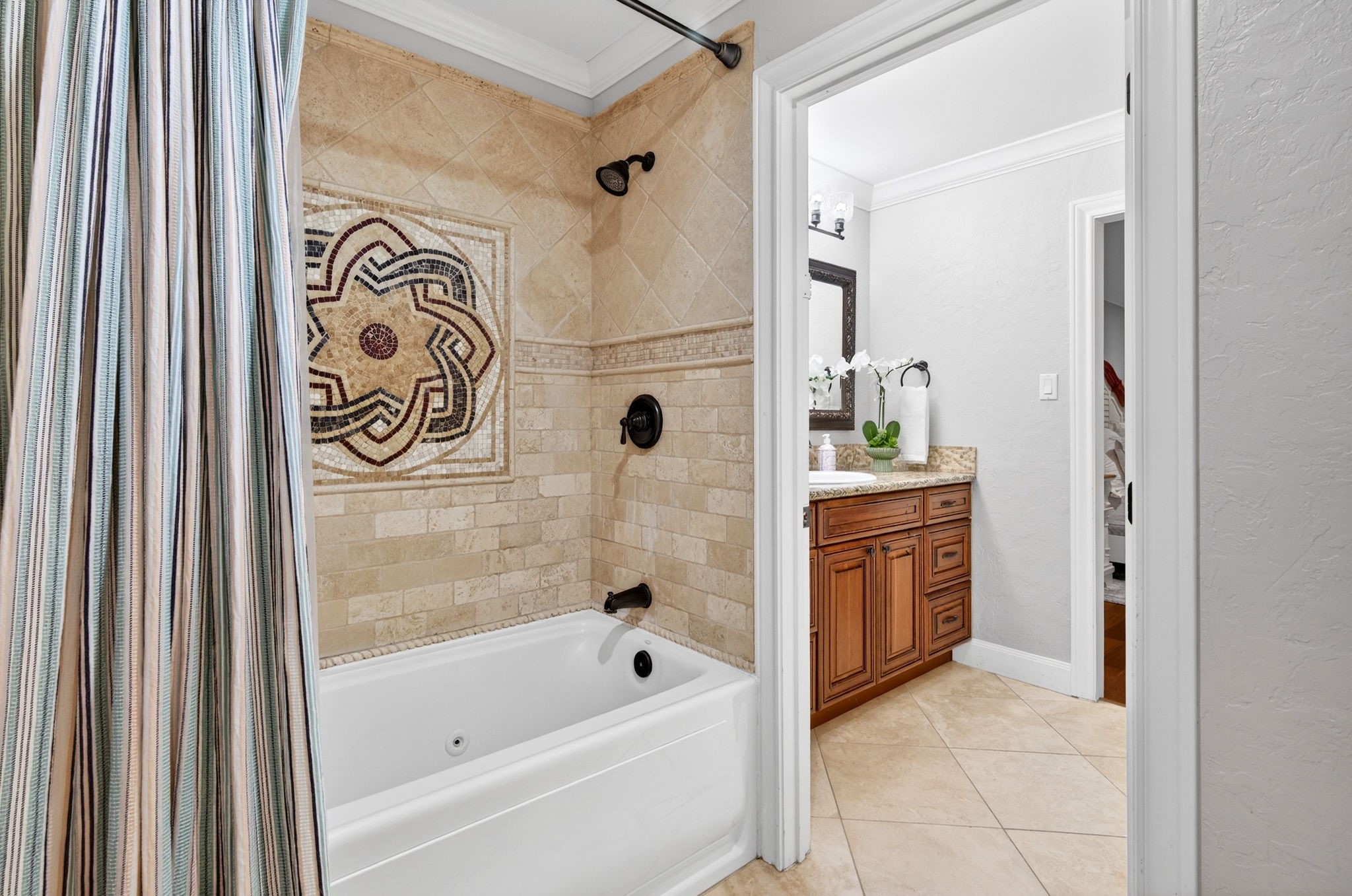 20006 Gable Point Drive Katy, TX 77450 - Photo 24 of 44 a bathroom with a bathtub and a shower