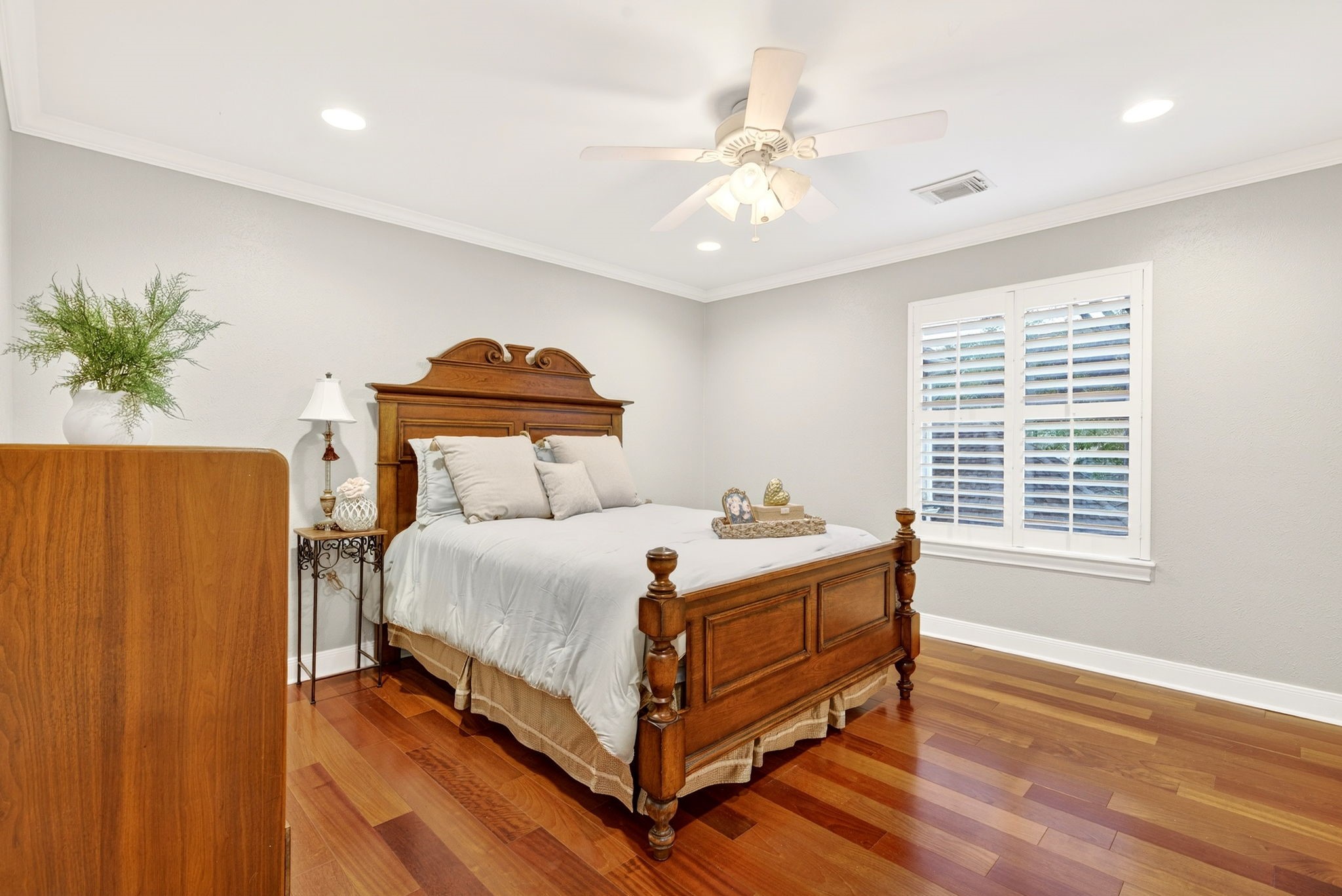 20006 Gable Point Drive Katy, TX 77450 - Photo 29 of 44 a bedroom with a bed and a chandelier