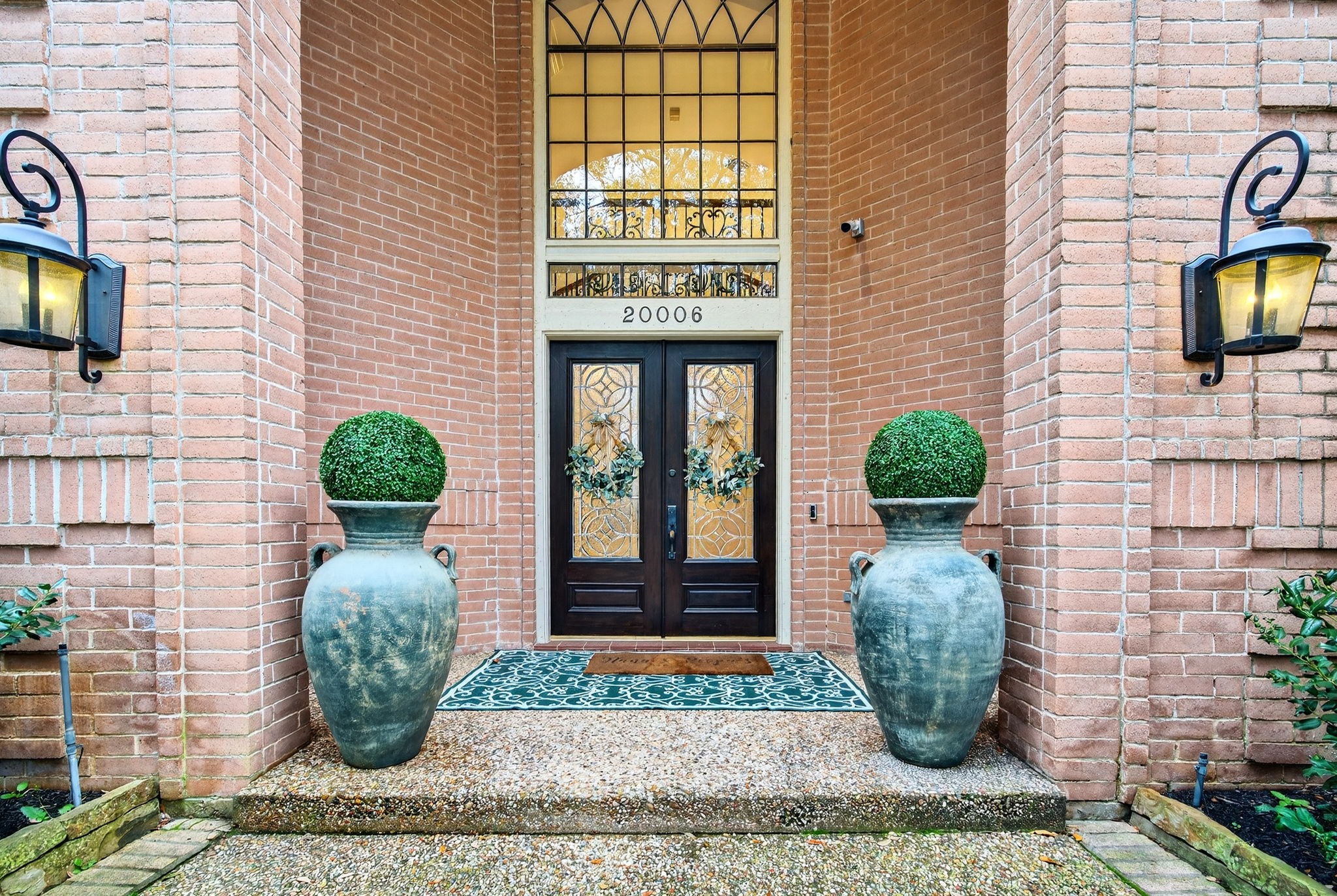 20006 Gable Point Drive Katy, TX 77450 - Photo 4 of 44 a front view of a house with garden
