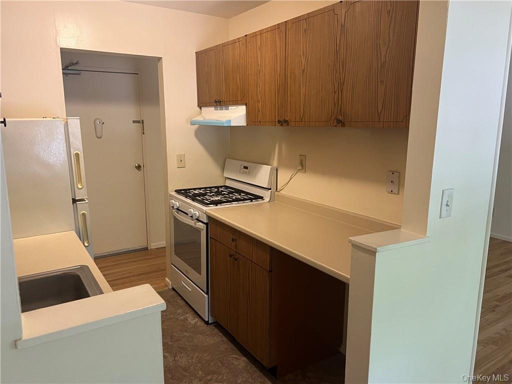 65 Curie Road, Unit G7 Cornwall-on-Hudson, NY 12520 - Photo 5 of 12 a room with storage and utility