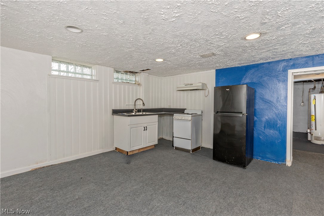 5659 Shawnee Road Lyndhurst, OH 44124 - Photo 24 of 33 Lower level recreation room w/ kitchenette