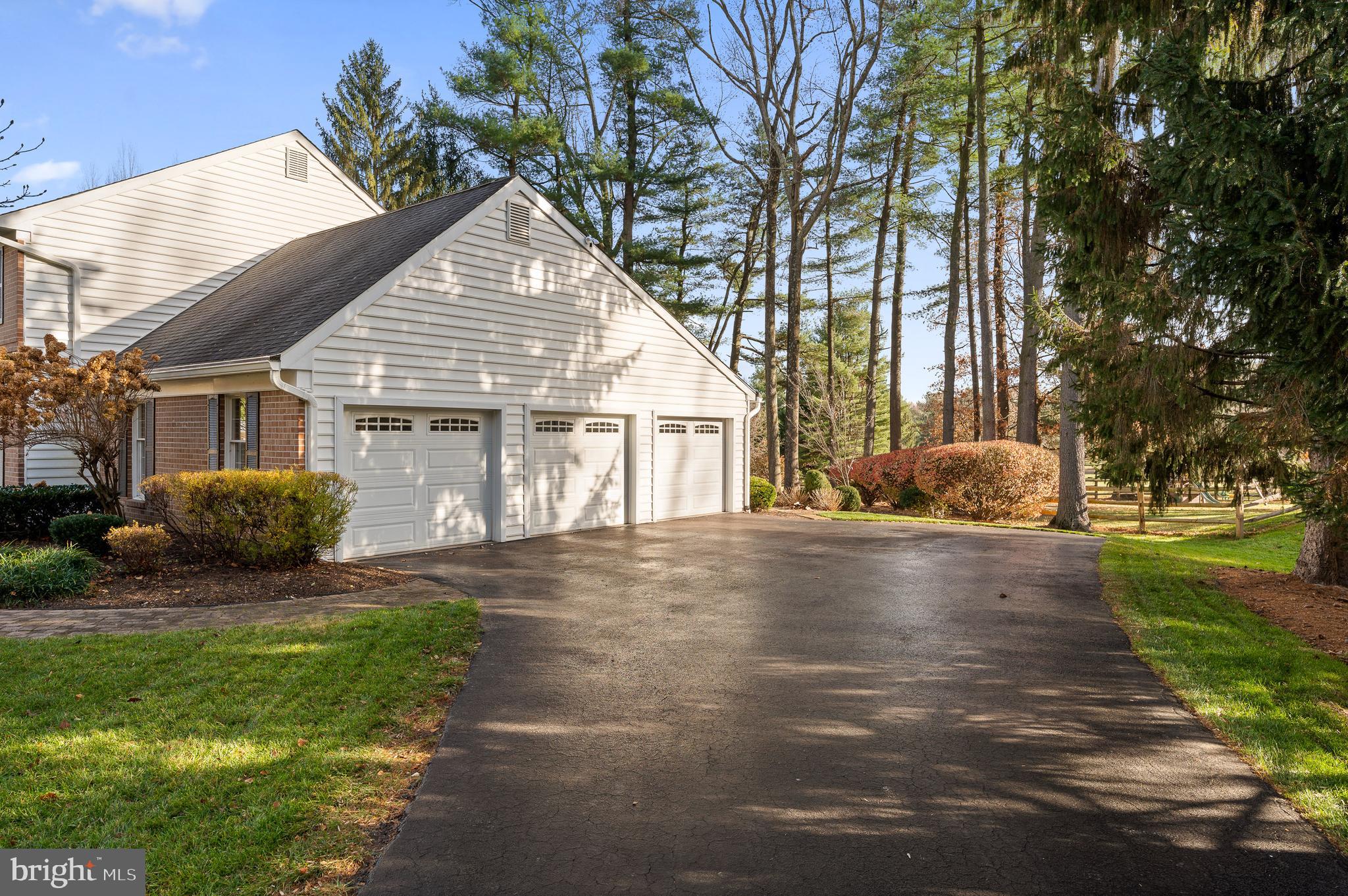 6 Willow Pond Road Malvern, PA 19355 - Photo 35 of 36 3-Car Garage w/ a Separate Side Door to Rear Yard